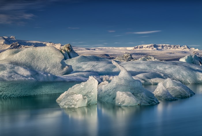 Icebergs in Iceland under a blue sky