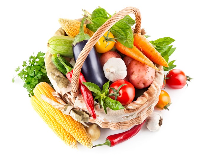Vegetables in a wicker basket: Corn, Eggplant, Tomatoes, Carrots, Garlic, Chili pepper