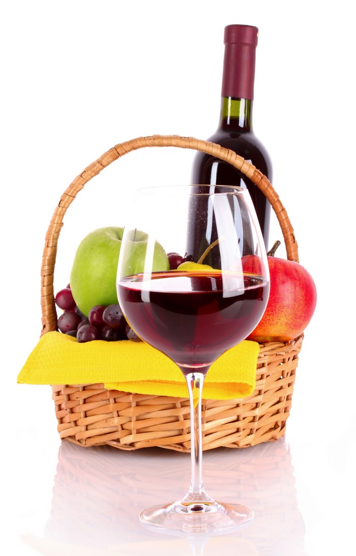 Wine bottle, fruit basket, and wine glass
