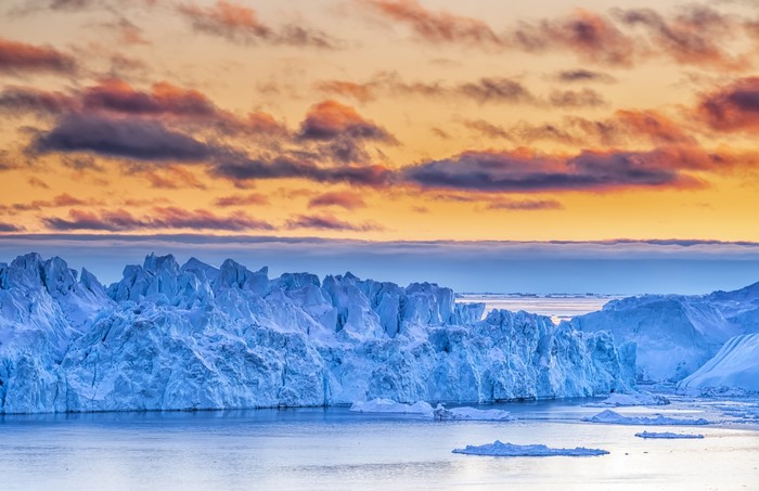 4K Greenland Ice Bay with Sunset Clouds
