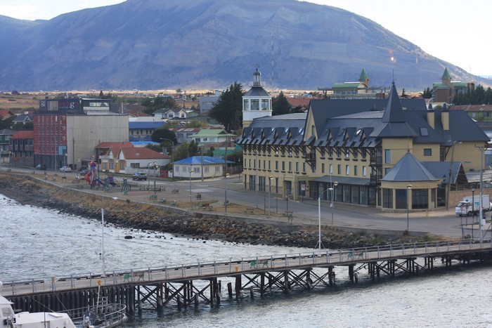 Punta Arenas waterfront with buildings and mountains