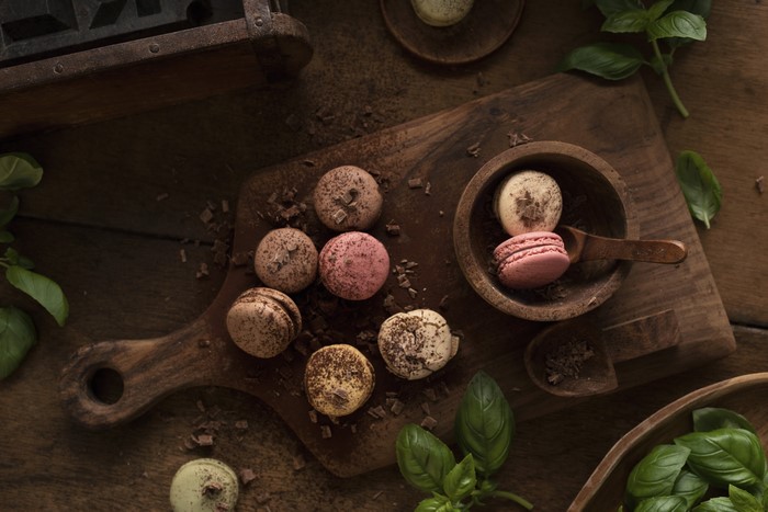 Chocolate Macarons on a Cutting Board