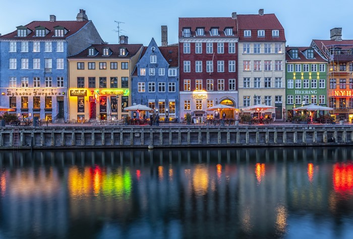 Nyhavn waterfront with colorful buildings and canal in Copenhagen