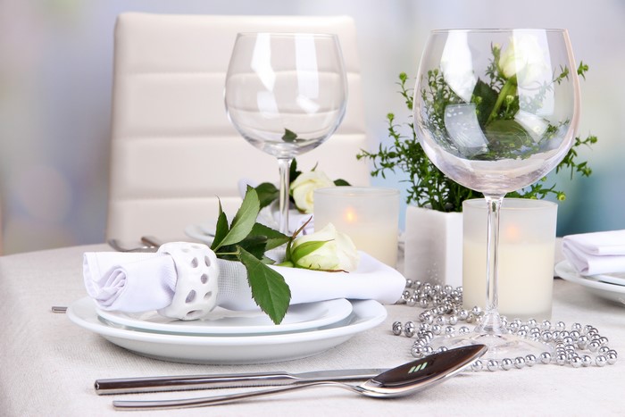 Table setting with roses and candles