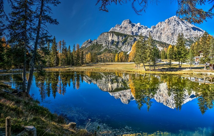 Lake Antorno reflection of Dolomites mountains in Italy