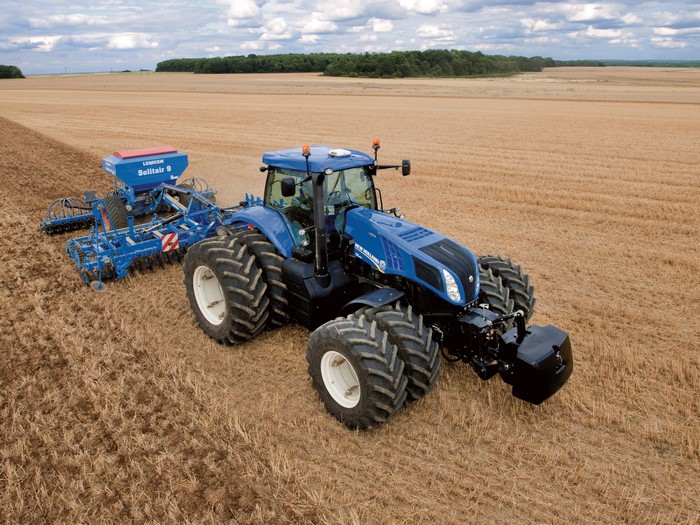 New Holland T8.360 tractor plowing a field