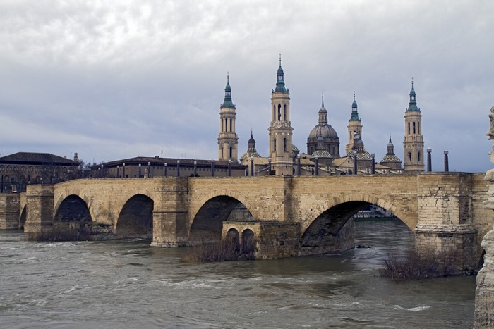 Puente de Piedra over Ebro River with Cathedral-Basilica of Our Lady of the Pillar, Saragossa, Spain