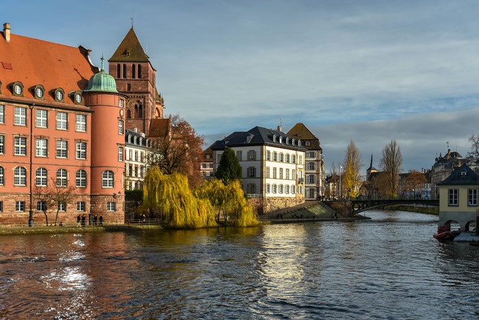 Strasbourg, France: Riverfront Buildings and Cathedral Tower