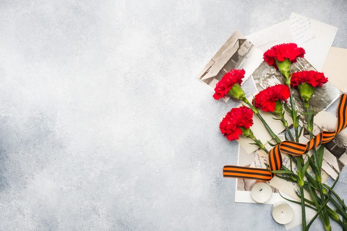 Red Carnations and Old Photos with St. George Ribbon