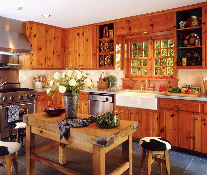 Rustic wooden kitchen with island and farmhouse sink