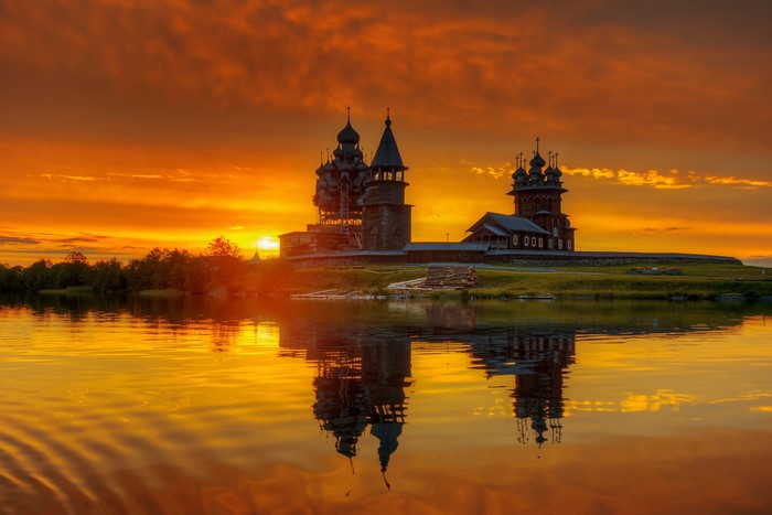 Wooden churches on Kizhi Island at sunset, Karelia, Russia