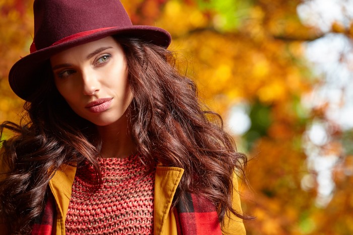 Woman in Hat and Autumn Scenery