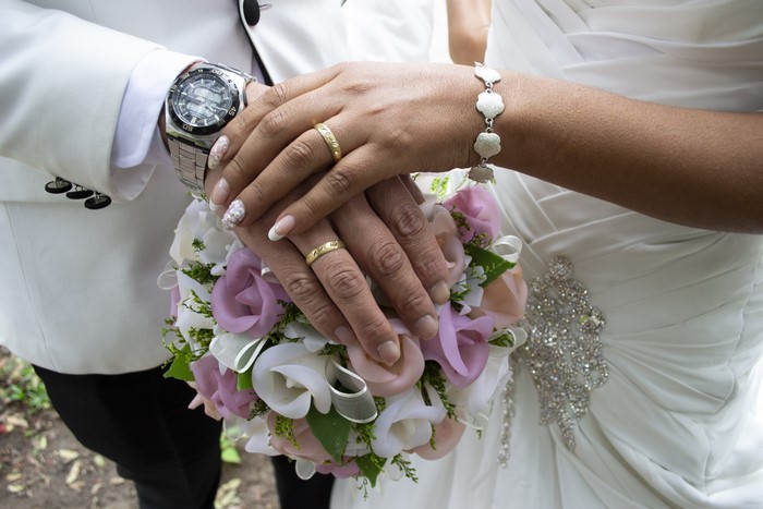 Wedding rings and bouquet