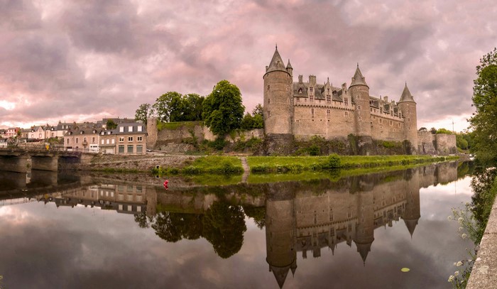 Josselin Castle reflected in the river in France