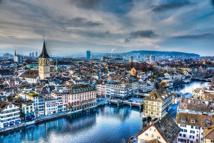 Zurich cityscape with Limmat river and church tower
