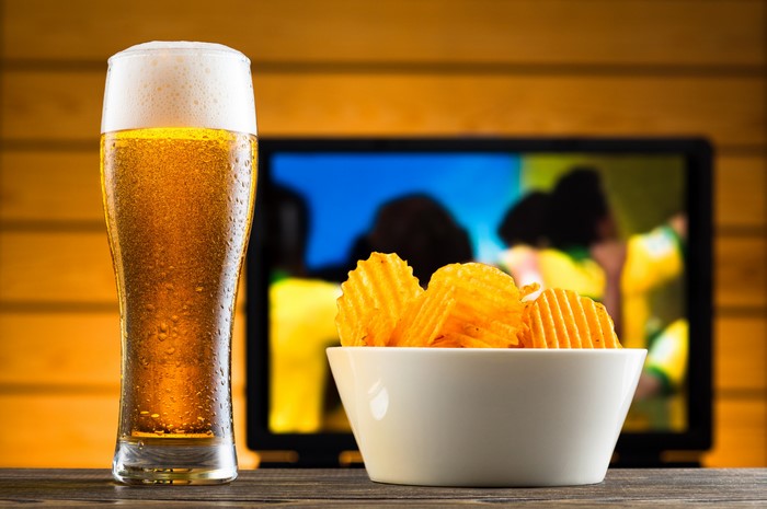 Beer and chips in front of TV