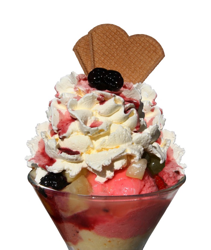 Ice cream sundae with whipped cream and cherry