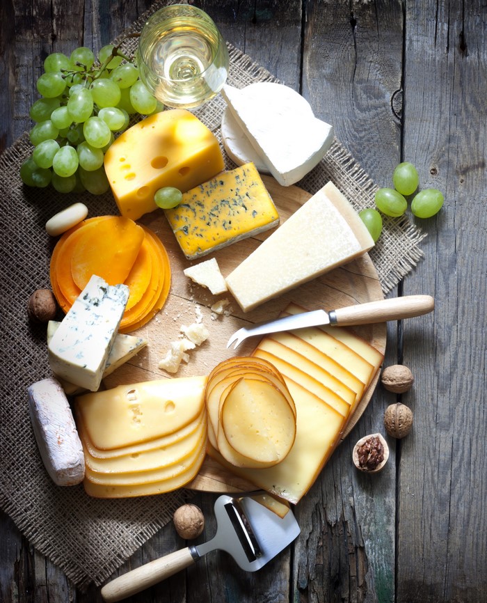4K Cheese Platter with Grapes and Nuts on Wood