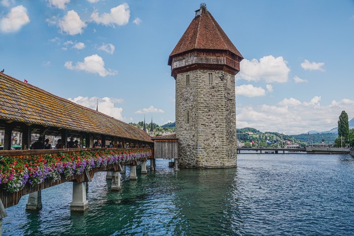 Chapel Bridge and Water Tower over Reuss River in Lucerne, Switzerland