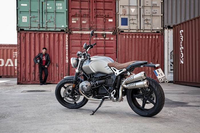 Man with BMW R nineT Scrambler motorcycle