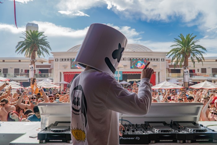 Marshmello DJing at a Pool Party