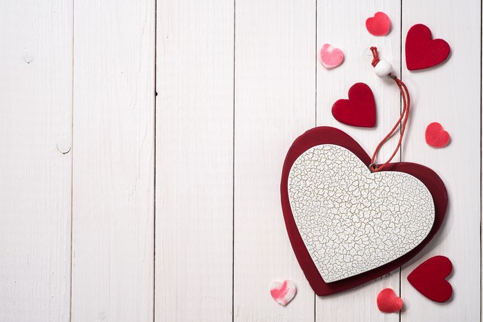 Valentine's Day hearts on wood planks