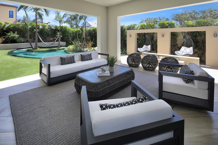 Outdoor Living Room with Pool and Fireplace