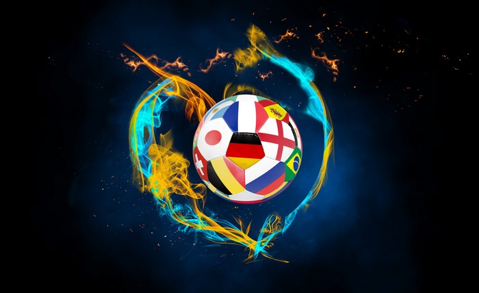 Soccer ball with flags and fire