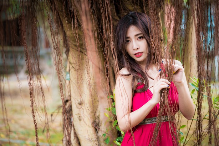 4K Portrait of Woman in Red Dress with Hanging Roots