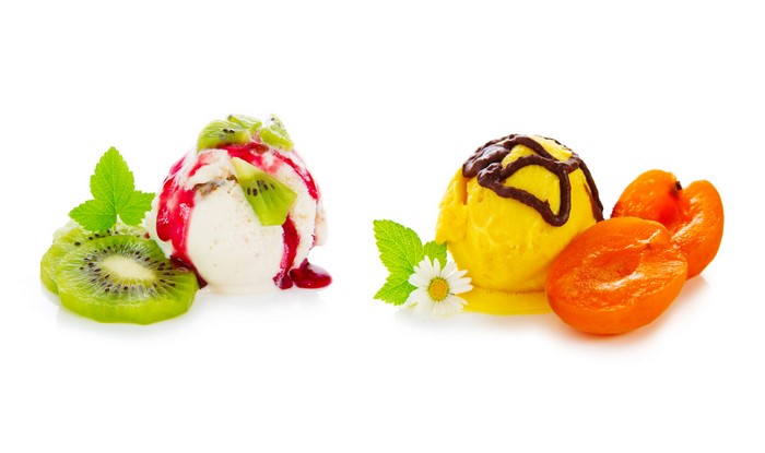 Ice cream scoops with kiwi and apricot toppings