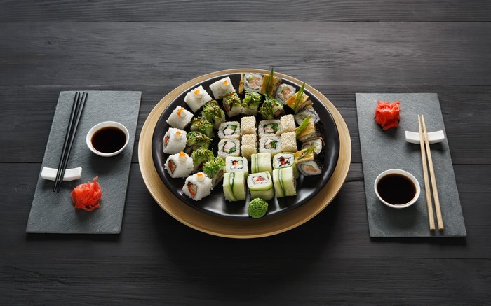 Sushi platter with chopsticks and soy sauce