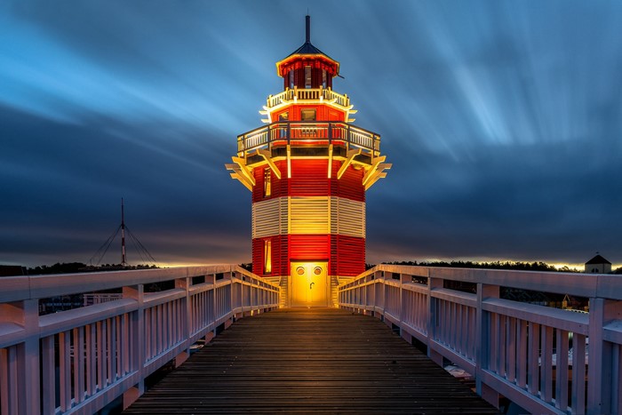 Rheinsberg Lighthouse at Evening with Bridge in Germany