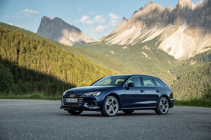 Blue Audi A4 Avant 35 TDI parked in mountains