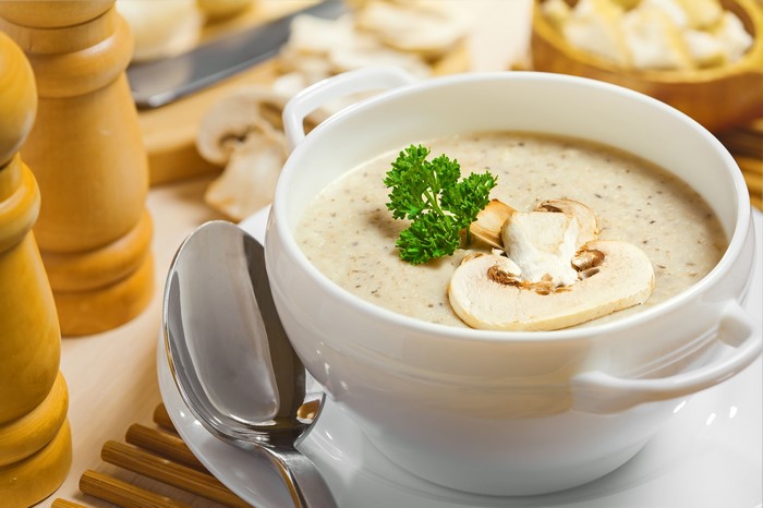 Mushroom soup with parsley and mushrooms