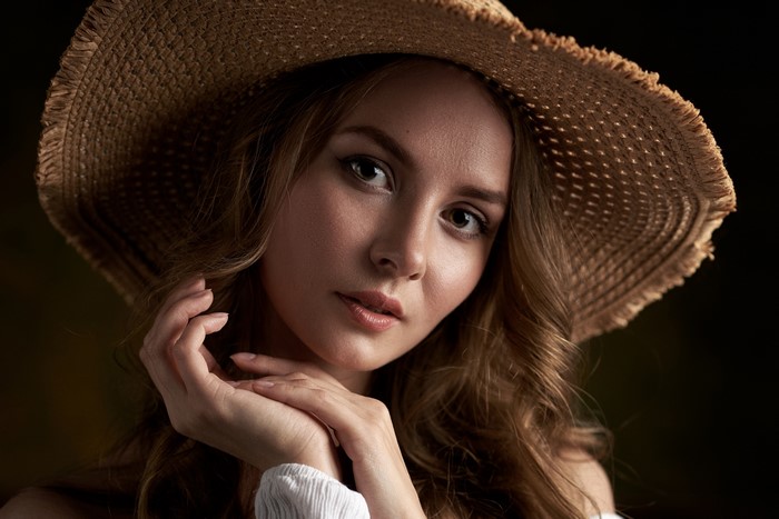 Katya Halpert wearing a straw hat