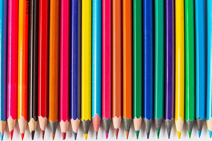 A row of colorful pencils