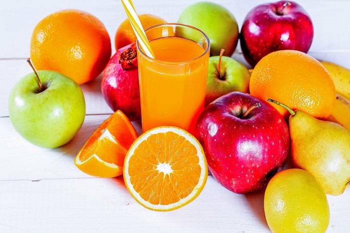Assortment of Fruits and Orange Juice
