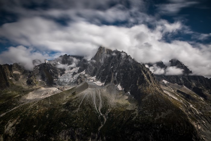4K Les Drus Mountains with Clouds in Alps, France