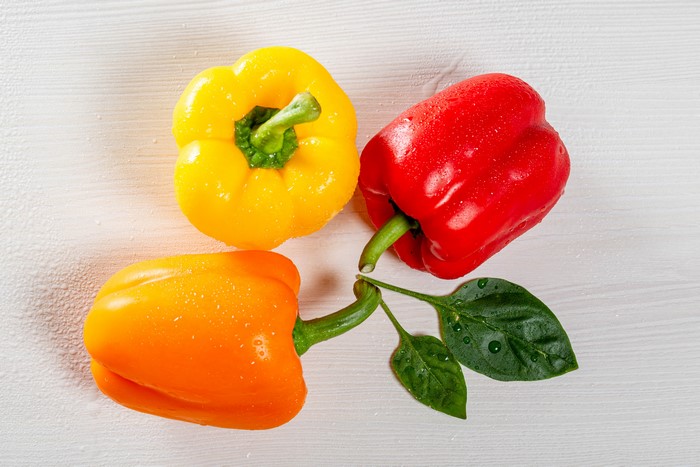 Three Bell Peppers: Yellow, Red, and Orange