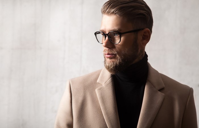 Man with Beard and Glasses Wearing Coat