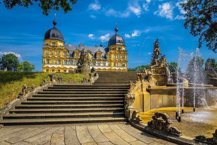 Seehof Palace with grand staircase and fountain