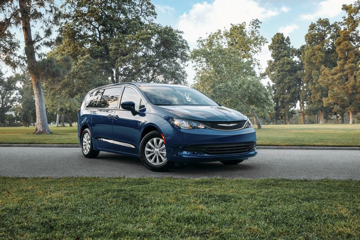 Blue Chrysler Voyager parked on a road