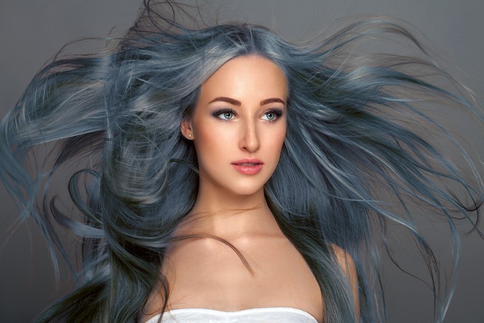 Woman with flowing gray hair