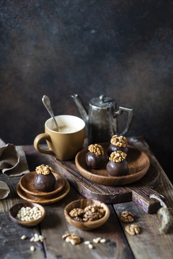 Chocolate candies with walnuts and coffee