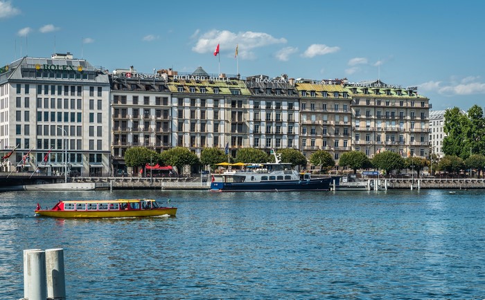 Geneva, Switzerland waterfront with Rolex and Blancpain buildings