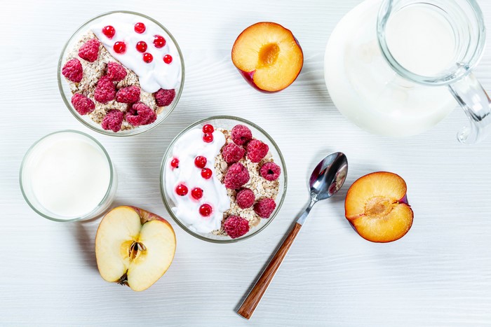 Muesli with berries, fruit, and milk