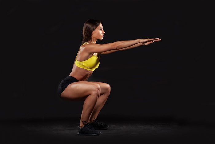 Woman performing a squat exercise