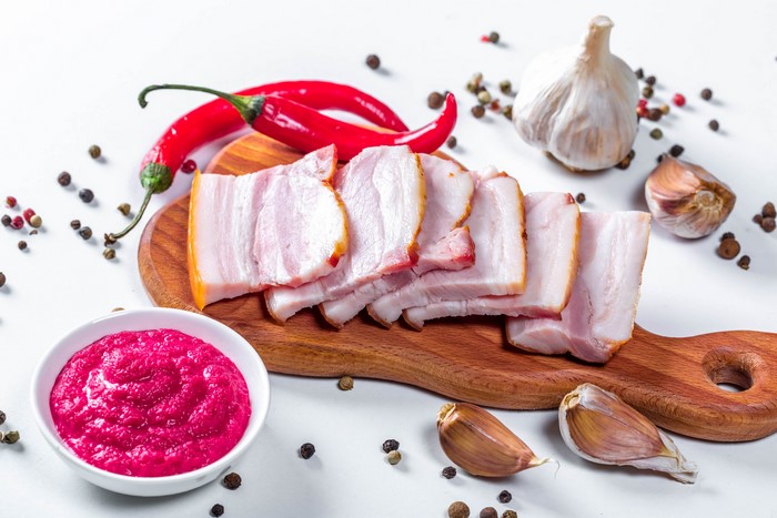 Sliced Salo with Garlic, Chili Peppers, and Beetroot Dip