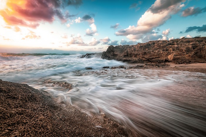 4K Waves crashing on rocky coast in Israel