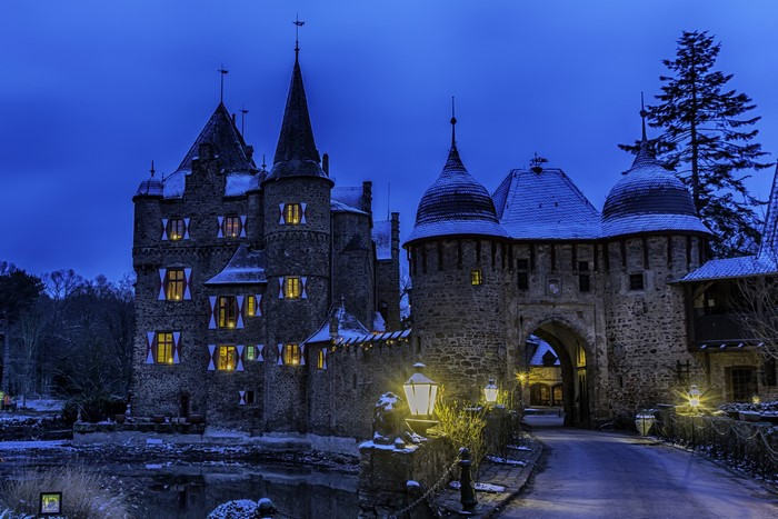 Burg Satzvey castle in Germany at dusk